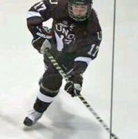 Ashley Johnston shoots a puck